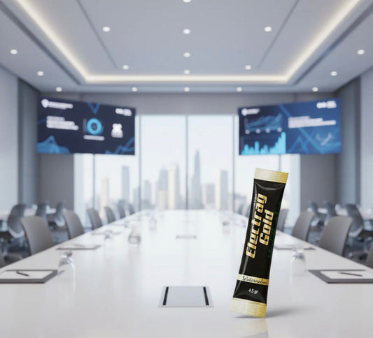 Electrag Gold sugar-free electrolyte sachet displayed in a modern Dubai corporate conference room during a professional hydration and wellness setting